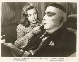DARK PASSAGE (1947) Photo | Lauren Bacall feeds bandaged Humphrey Bogart