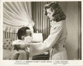 DARK PASSAGE (1947) Photo | Lauren Bacall removes Humphrey Bogart's bandages
