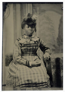 AFRICAN AMERICAN WOMAN IN PERIOD ATTIRE (ca. 1860-80) Tintype photo