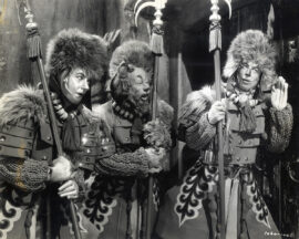 WIZARD OF OZ, THE (1939) Characters in Winkie costumes