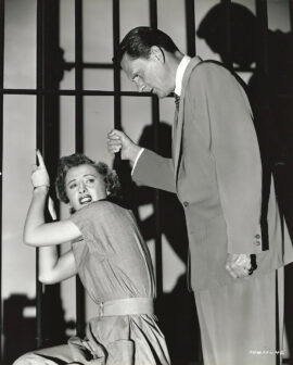 FILE ON THELMA JORDON (1950) Publicity photo of noir moment