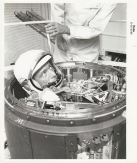 ASTRONAUT M. SCOTT CARPENTER PRACTICES EGRESS FROM SPACECRAFT (1962) Official NASA publicity photo