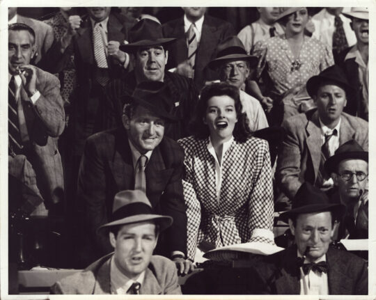 WOMAN OF THE YEAR | SPENCER TRACY, KATHARINE HEPBURN AT BALL GAME (1942) Photo